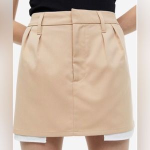 Beige Mini Skirt with Exposed Pockets